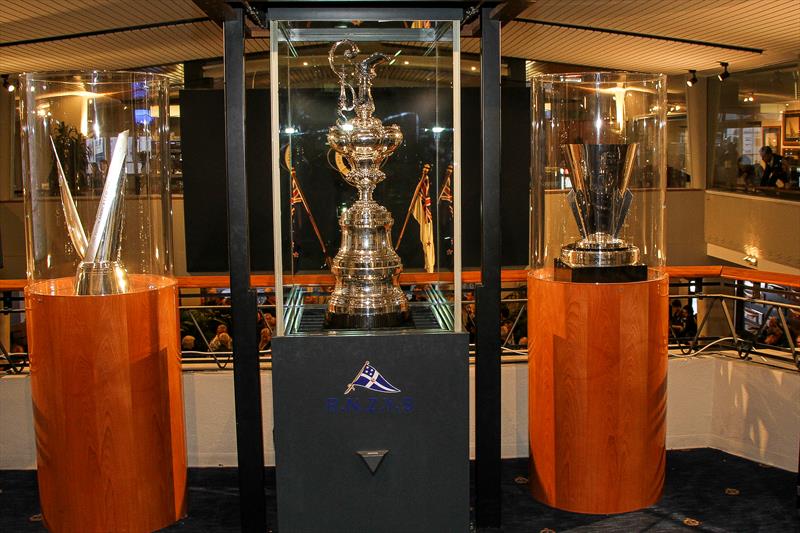 The America's Cup on display in the Royal New Zealand Yacht Squadron, flanked by the two Challenger trophies won by Emirates Team New Zealand in the 2013 and 2017 America's Cup regattas photo copyright Richard Gladwell / Sail-World.com taken at Royal New Zealand Yacht Squadron and featuring the ACC class
