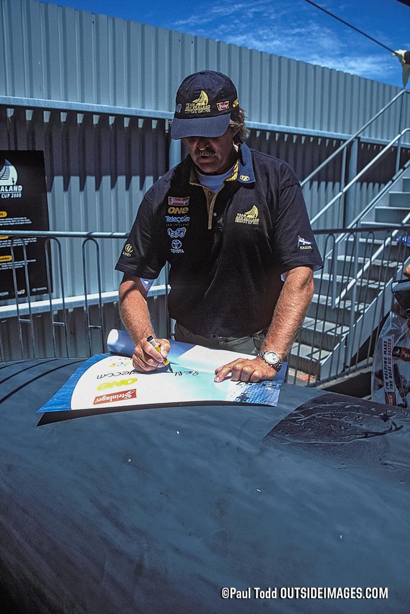 Peter Blake on signing duty outside the team base - 2000 America's Cup - March 2000 - Waitemata Harbour - Auckland - New Zealand photo copyright Paul Todd/Outside Images taken at Royal New Zealand Yacht Squadron and featuring the ACC class