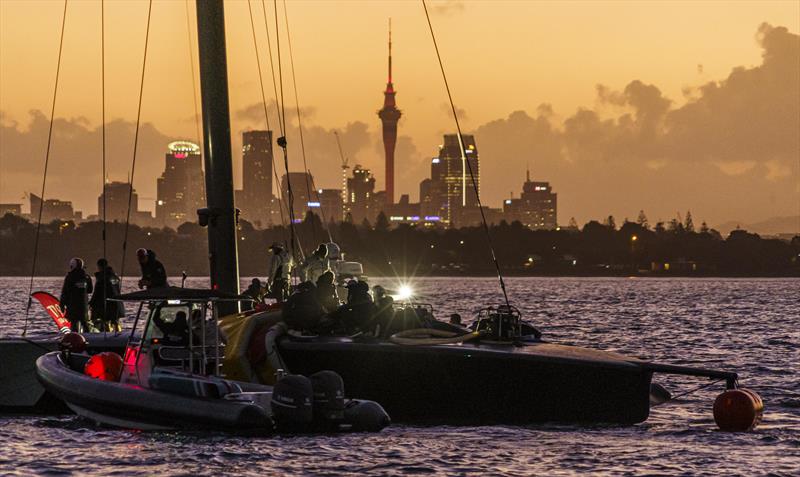 American Magic's Patriot under tow at sunset on the Waitemata harbour - January 17, 2021, Prada Cup photo copyright COR 36 | Studio Borlenghi taken at Circolo della Vela Sicilia and featuring the ACC class