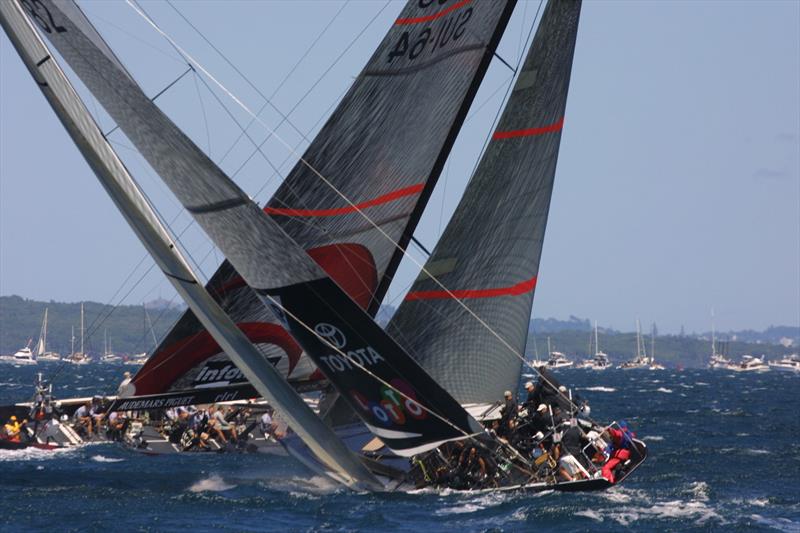  Alinghi crosses in front of Team New Zealand on the first leg of Race 1 of the America's Cup - photo © Bob Grieser / Louis Vuitton