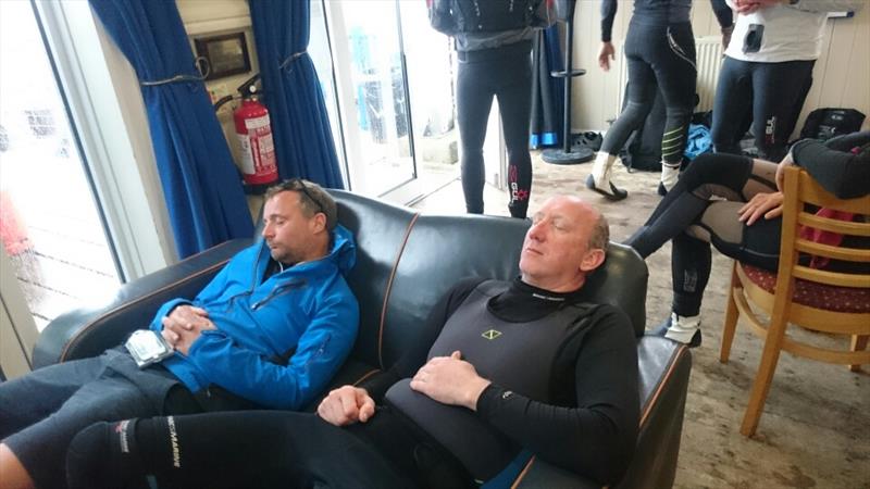 Snoozing while waiting for the wind at the Gul B14 Nationals at Whitstable photo copyright Mark Barnes taken at Whitstable Yacht Club and featuring the B14 class