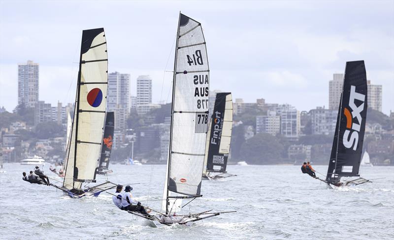 Leading 18s with a B14 on the way home - Sydney Harbour Marathon photo copyright SailMedia taken at Australian 18 Footers League and featuring the B14 class