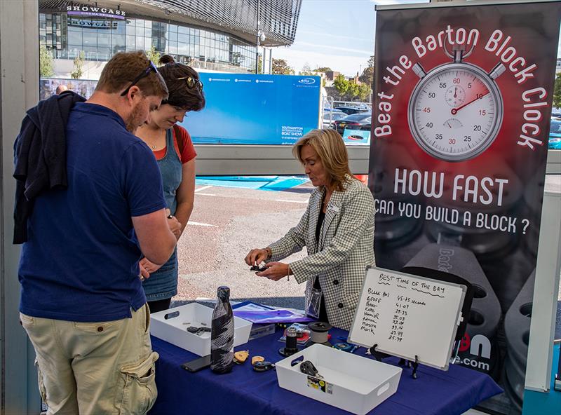 Suzanne demonstrates how to build the block - photo © Barton Marine