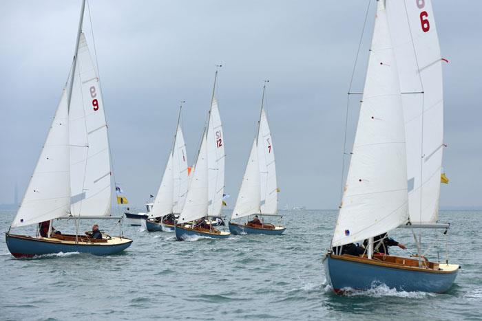 Bembridge One Designs race boat for boat on day 3 at Charles Stanley Direct Cowes Classics Week photo copyright Rick Tomlinson / www.rick-tomlinson.com taken at Royal London Yacht Club and featuring the Bembridge One Design class