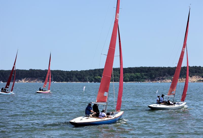 Redwing fleet upwind on Sunday at the International Paint Poole Regatta 2026 photo copyright Mark Jardine taken at Parkstone Yacht Club and featuring the Bembridge Redwing class