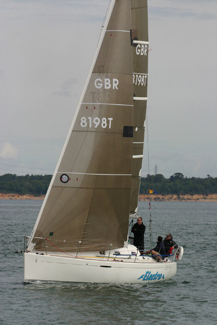 The Beneteau First 31.7 'Electra' in the JOG Cowes to Weymouth Race 2006 photo copyright Martin Augustus / www.sailingimages.co.uk taken at  and featuring the Beneteau First 31.7 class