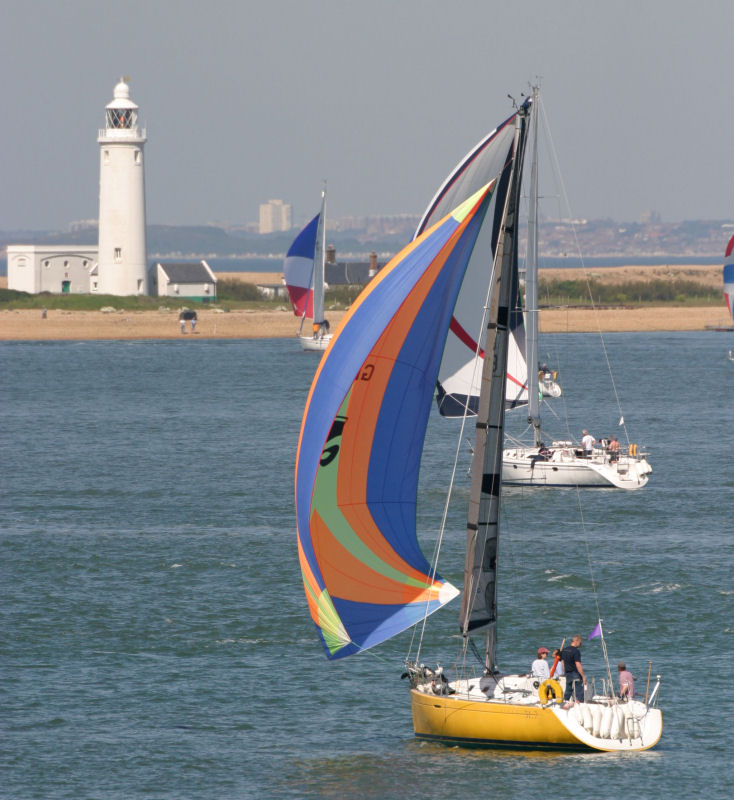 12 31.7s race in the JPMorgan Asset Management Round the Island Race photo copyright Martin Augustus / www.sailingimages.co.uk taken at  and featuring the Beneteau First 31.7 class