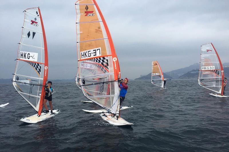 Techno 293 fleet on day 2 of Hong Kong Race Week photo copyright RHKYC taken at Royal Hong Kong Yacht Club and featuring the Bic Techno class