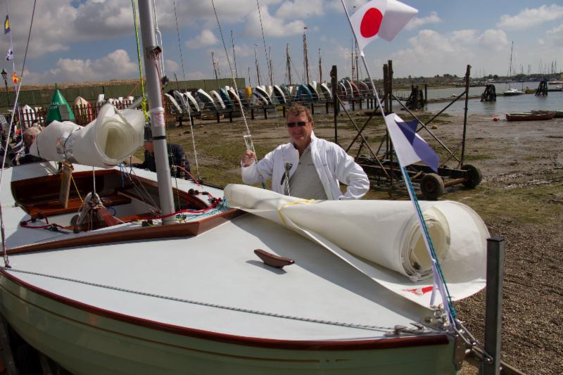 Owner Alan Hicks celebrates the launching of BOD C54 Storm Petrel photo copyright Tim Bees taken at Brightlingsea Sailing Club and featuring the Brightlingsea One Design class