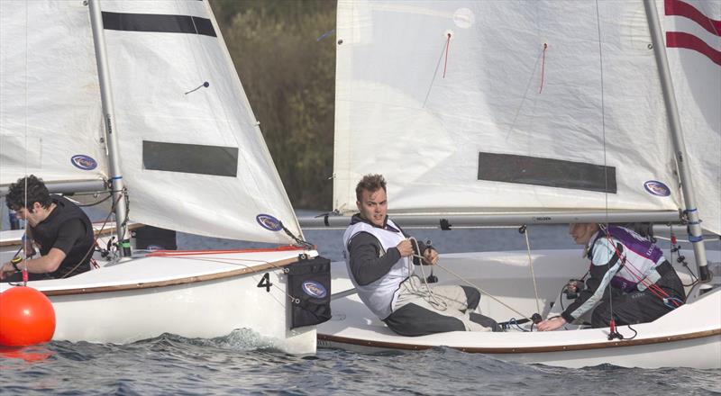 Connor Miller of Loughborough in close semi-final at the BUCS-BUSA Team Racing Championship 2015 photo copyright David Eberlin taken at Notts County Sailing Club and featuring the BUSA class