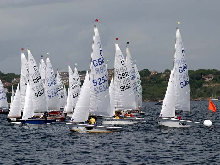 The pin end of the start line at the Cadet Nationals photo copyright Mike Rice / www.fotoboat.com taken at Weymouth & Portland Sailing Academy and featuring the Cadet class