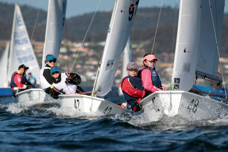 Bow 48 Sparkle (Emma Kelly and Will Farnell, Vic) leading bow 42 Impulse (Laura Cooper and Isabelle Wilcox, Tas) - International Cadet National Championships photo copyright Pete Harmsen taken at Sandy Bay Sailing Club and featuring the Cadet class