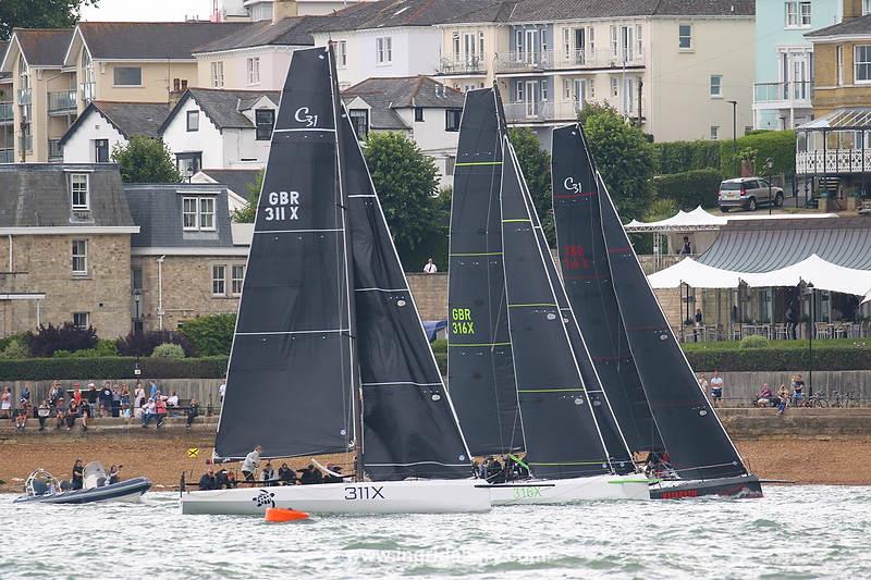 Cowes Week 2021 day 1 photo copyright Ingrid Abery / www.ingridabery.com taken at Cowes Combined Clubs and featuring the Cape 31 class