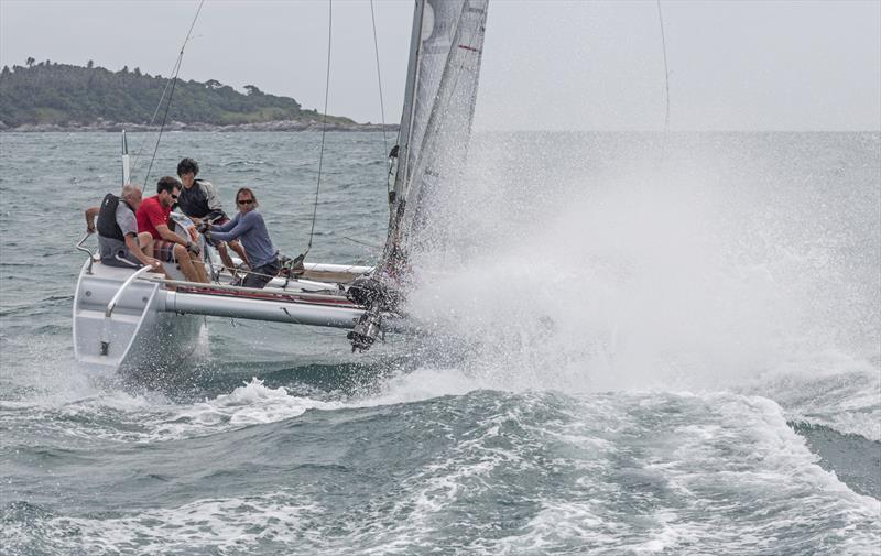 Twin Sharks on day 3 of the Phuket King's Cup Regatta photo copyright Guy Nowell / Phuket King's Cup taken at Royal Varuna Yacht Club and featuring the Catamaran class