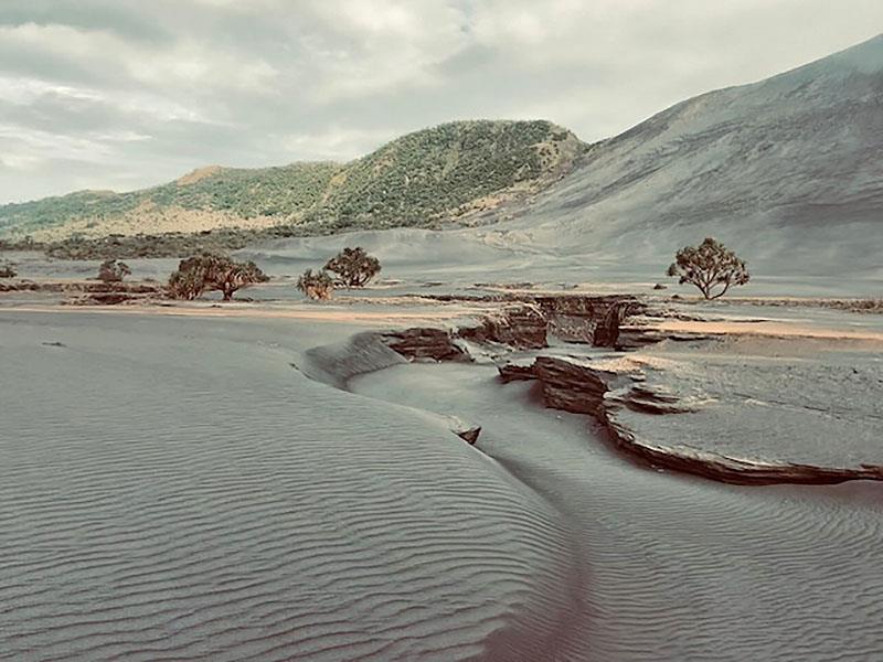 The islands of Vanuatu are worldwide most struck-by-catastrophes. Earthquakes, the active volcanos, cyclones occur frequently. This is coming closer to the volcano. The nearby villages have their essential gardens covered by ash frequently - photo © Renate Klocke