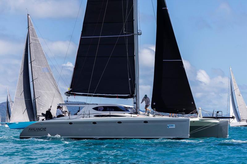 Avalanche giving it a nudge - Jeanneau and 74 Islands Airlie Beach Race Week, Day 6 photo copyright Andrea Francolini / ABRW taken at Whitsunday Sailing Club and featuring the Catamaran class