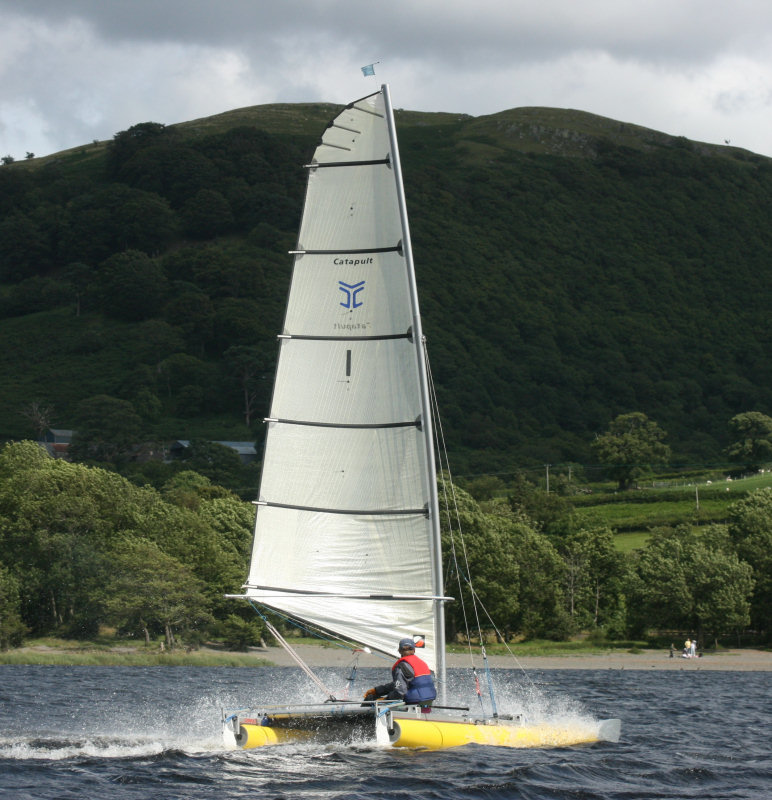 Alex Montgomery, son of Catapult designer Jon, sailing Catapult No.1, storms to victory in the 25th Anniversary Nationals photo copyright Stuart Ede taken at Bala Catamaran Club and featuring the Catapult class