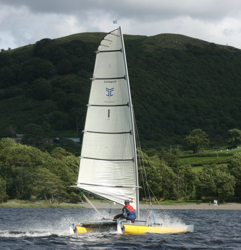 Alex Montgomery, son of Catapult designer Jon, sailing Catapult No.1, storms to victory in the 25th Anniversary Nationals photo copyright Stuart Ede taken at  and featuring the Catapult class