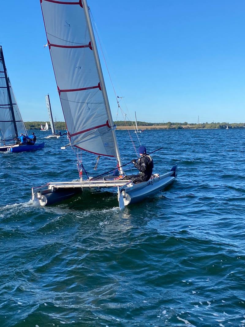 Gareth sails through the gate on his way to victory at Grafham photo copyright Nigel Denchfield taken at Grafham Water Sailing Club and featuring the Catapult class