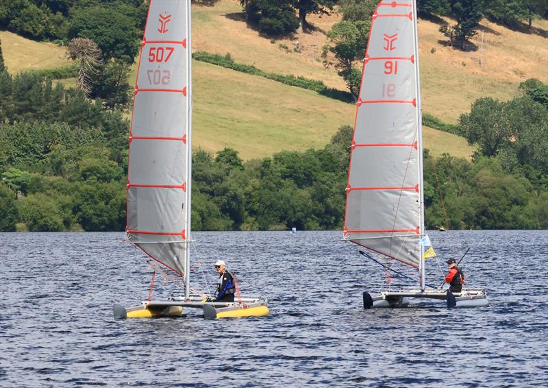 Gareth Ede (91), soon to become National Champion, chases down Paul Ellis in Race 5 - Catapult National Championships at Bala photo copyright John Hunter taken at Bala Sailing Club and featuring the Catapult class