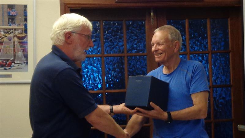 Presentation to Richard Johnson (right) by David Newton to mark Richard's retirement after twenty years as chair of the class association during the UK Challenger Championships at Rutland photo copyright Marion Edwards taken at Rutland Sailing Club and featuring the Challenger class