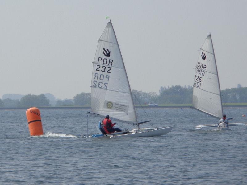 Neil Bartlett and Murray Palmer (still on buddy seat!) chasing Tom Macintosh in the Challenger open meeting at Oxford photo copyright Marion Edwards taken at Oxford Sailing Club and featuring the Challenger class