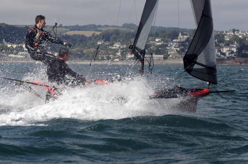 Roland causing a splash during the Cherub Nationals in Torbay photo copyright Jean Border / www.borderphotos2010.com taken at Royal Torbay Yacht Club and featuring the Cherub class