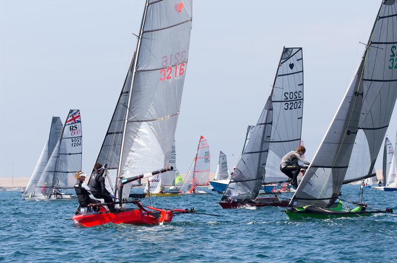 Cherubs at the Weymouth Dinghy Regatta - Jamie Pearson and Gerogie Altham pull a fast one on the fleet in Poppy photo copyright Richard White taken at Castle Cove Sailing Club and featuring the Cherub class