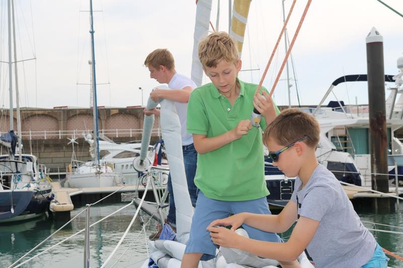 13 cadets from the Royal Channel Island Yacht Club spend the day aboard the Class 40 yacht Imerys photo copyright Phil Sharp Racing taken at Royal Channel Islands Yacht Club and featuring the Class 40 class