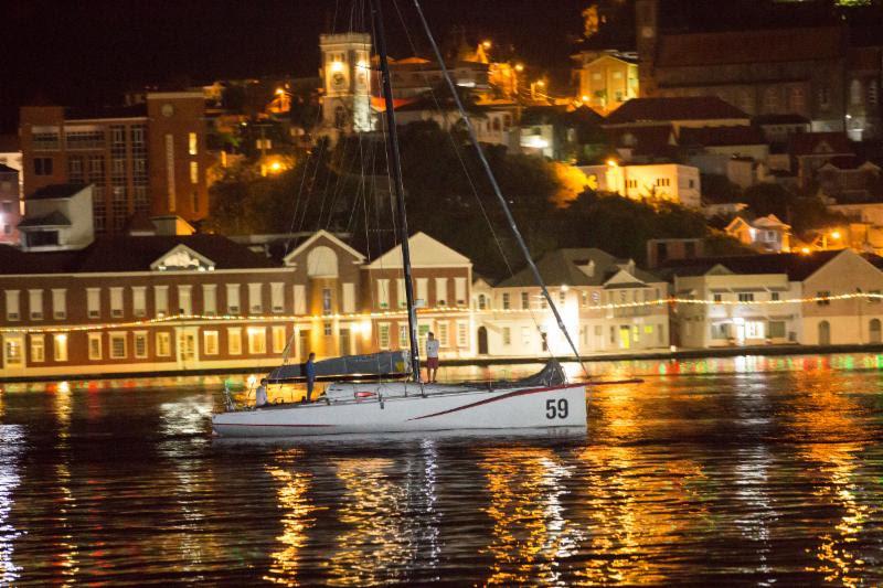 Class40 RED makes her way into Camper & Nicholsons Port Louis Marina after finishing the race and taking Class40 victory photo copyright RORC / Arthur Daniel taken at Royal Ocean Racing Club and featuring the Class 40 class