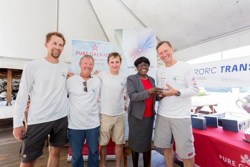 The crew of Class40 winner Red pick up their prize - photo © RORC / Arthur Daniel