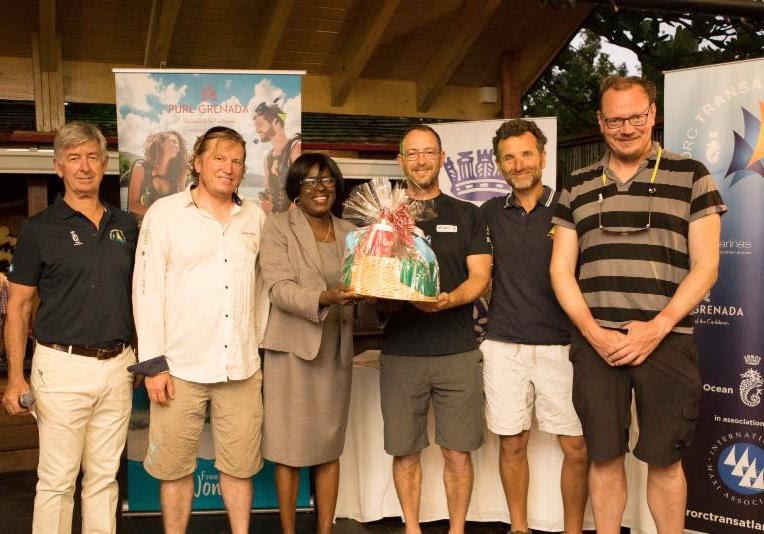 French/Finish team on Stephane Bry's Class40 Sirius completed the race in 16 days 08hrs 33mins 26secs, just in time for the prize giving party. L: Eddie Warden Owen, RORC CEO, Stephane Bry, Grenadian Minister for Tourism & Civil Aviation, Dr. Clarice Mode - photo © Arthur Daniel / RORC