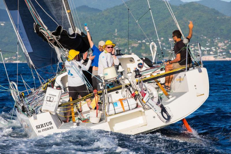 Let's get Sirius!! Stephane Bry, Ari Kaensaekoski, Philippe Magliulo and Jan Paukkunen celebrate after finishing the 2018 RORC Transatlantic Race - photo © RORC / Arthur Daniel