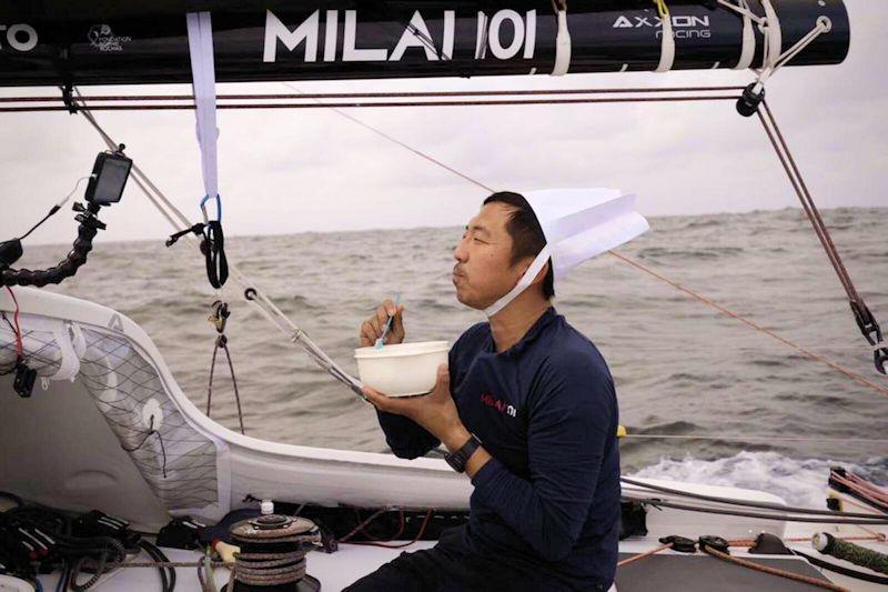 Masa Suzuki takes a meal in the Transat Jacques Vabre photo copyright Milai taken at  and featuring the Class 40 class