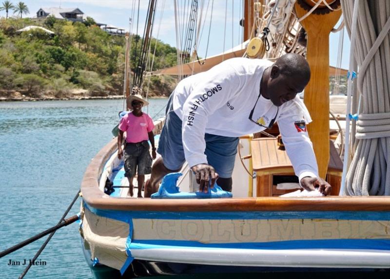 Blue tape, varnish, and proud, beamy smiles - Antigua Classic Yacht Regatta - photo © Jan Hein