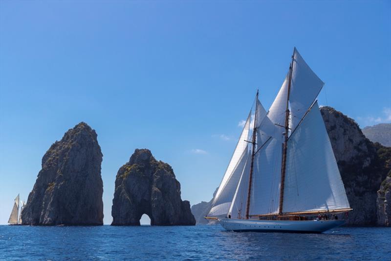 Naema ghosts towards the Faraglioni to take second in the opening round of the Schooner Cup Series - Capri Classica 2019 photo copyright Gianfranco Forza taken at Yacht Club Capri and featuring the Classic Yachts class