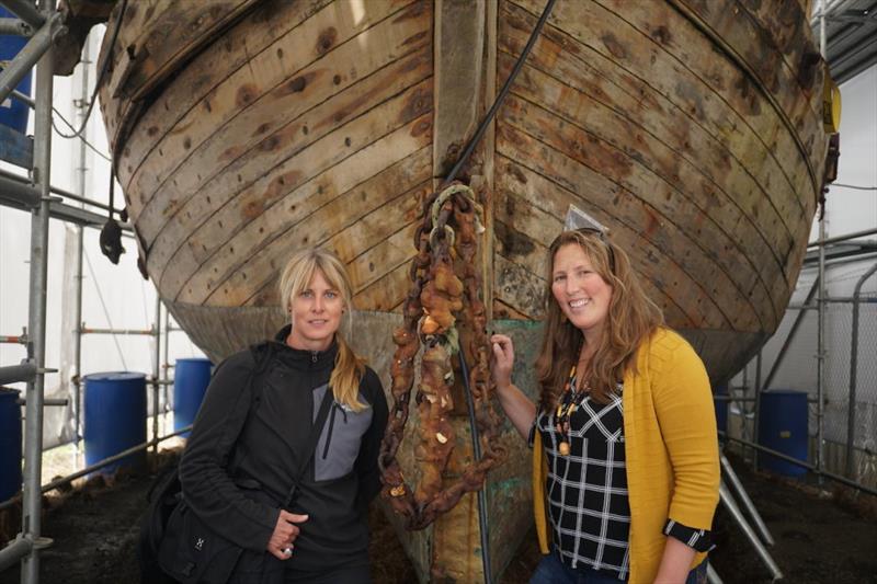 Conservators Sara Gainsford and Susanne Grieve Rawson with the hull of the Daring photo copyright Classic Yacht Charitable Trust taken at Royal New Zealand Yacht Squadron and featuring the Classic Yachts class