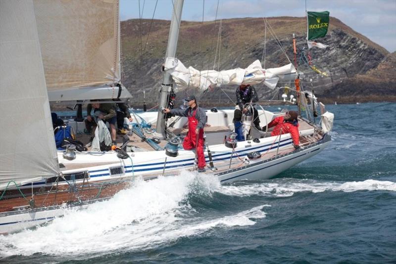 Joe Powder the gorilla mascot is one of the crew and a RORC member on board Desperado of Cowes! © Carlo Borlenghi/Rolex Top right: 1991 - Celebrating rounding the Fastnet Rock in style aboard Richard Loftus' Swan 65 Desperado of Cowes - photo © Rick Tomlinson