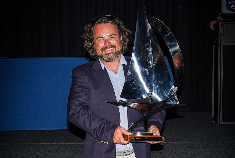 British Classic Week overall winner 'Oui Fling' - trophy accepted by Gareth Griffiths  photo copyright Chris Brown taken at British Classic Yacht Club and featuring the Classic Yachts class
