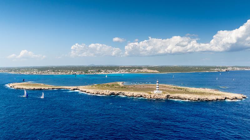 XXI Copa del Rey of Vintage Yachts of Vintage Yachts Day 4 - the fleet crossing Isla del Aire  - photo © SailingShots by María Muiña