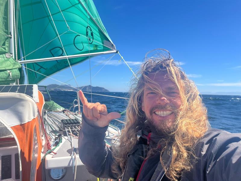 An ebullient Christian Sauer sailing ARGO past the Cape of Good Hope, with three oceans in the wake - photo © Christian Sauer / MGR2025