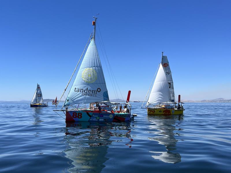 Glass out and motor sailing races begin with the wind a few miles to the west clearly visible on the horizon - photo © Don McIntyre / MGR2025