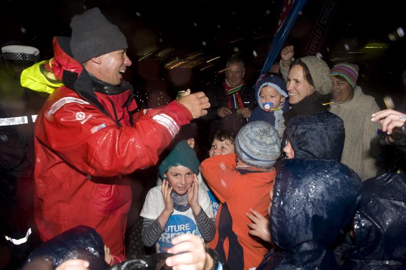 Dale Smyth arrives in Cape Town, greeting his wife (Nat) and children - photo © Clipper Race