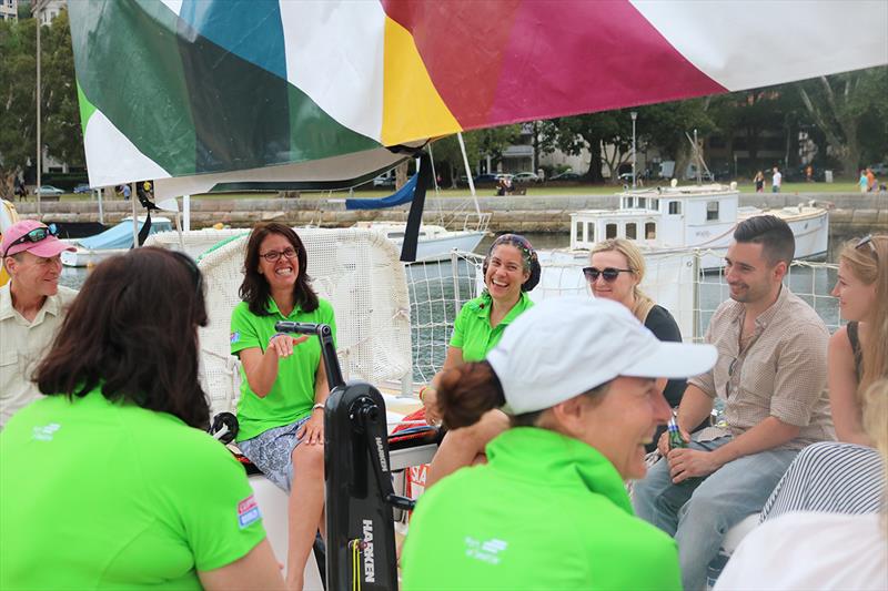 Shannon Dean (left) and Lizzie Howe (right) facing toward camera in green Visit Seattle tops - Clipper Round the World Yacht Race 2017-18 photo copyright Clipper Race taken at  and featuring the Clipper 70 class