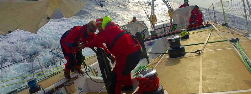 Picture on board Visit Seattle of crew on grinder in the sun - Clipper Round the World Yacht Race 8 Day 6 - photo © Clipper Race