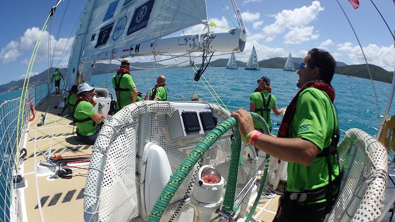 Simon on the bow of Clipper 70 Visit Seattle- Clipper Round the World Yacht Race - photo © Clipper Race