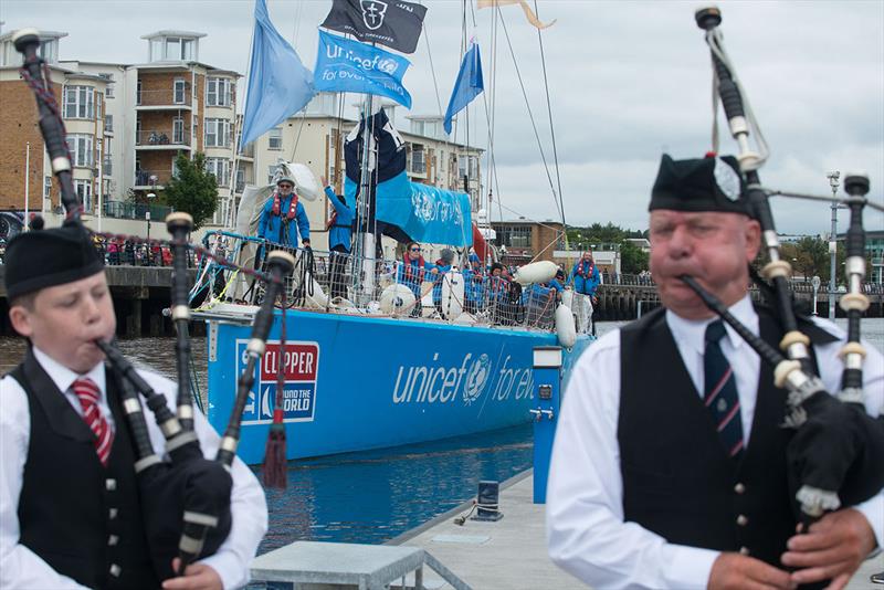 Pipers play as the Clipper Yacht, UNICEF arrives in second place in Derry-Londonderry on Monday after completing the LegenDerry transatlantic crossing from New York in the penultimate leg of the circumnavigation of the world photo copyright Martin McKeown taken at  and featuring the Clipper 70 class