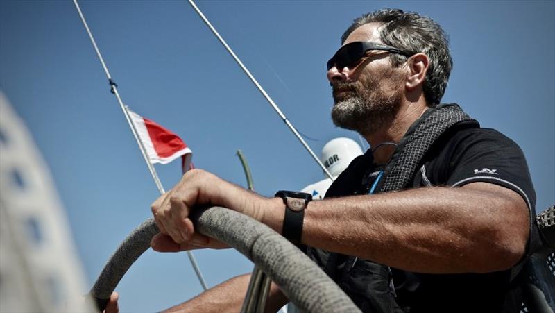 Round the world crew member Brian McNealey at the helm of Imagine your Korea. - The Clipper Race Leg 1 - Race 2, Day 19 photo copyright Clipper Race taken at  and featuring the Clipper 70 class