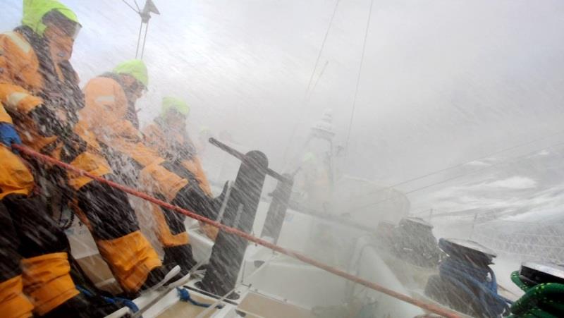 Waves crash over the deck of WTC Logistics - The Clipper Race Leg 2 - Race 3, Day 14 photo copyright Clipper Race taken at  and featuring the Clipper 70 class