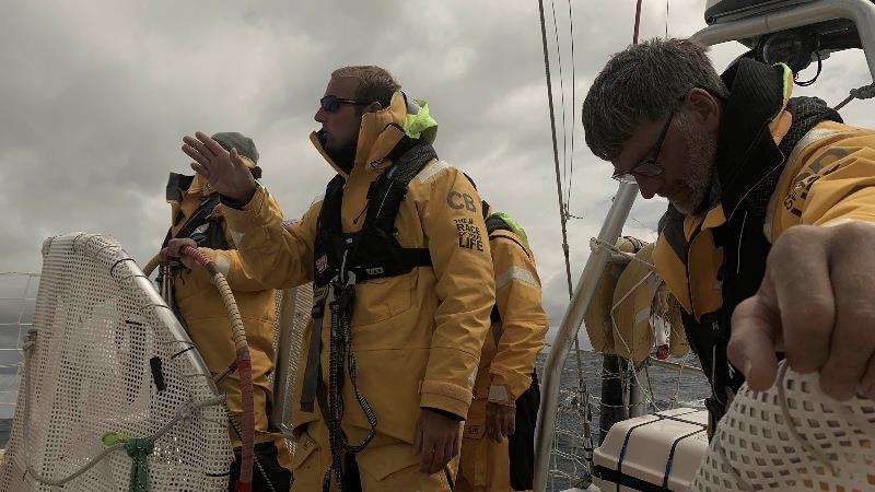 Qingdao Skipper Chris Brooks, briefing his team - The Clipper Race Leg 3 - Race 4, Day 12 photo copyright Clipper Race taken at  and featuring the Clipper 70 class